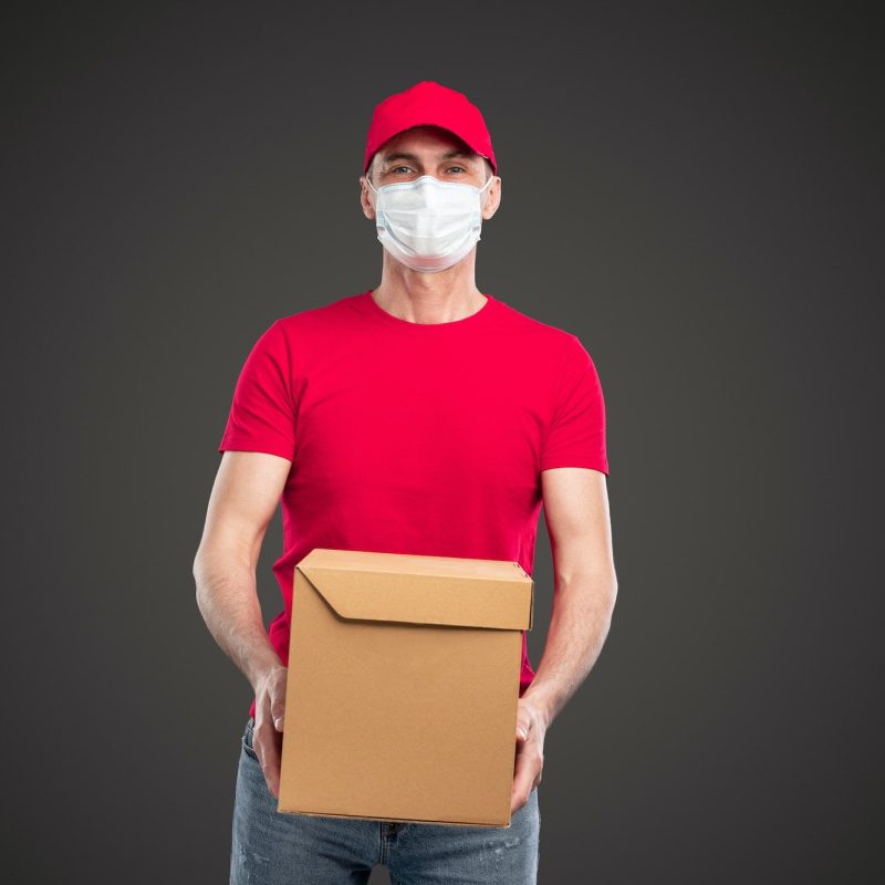 Courier delivering package during quarantine